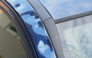 Carrosserie voiture grêlée